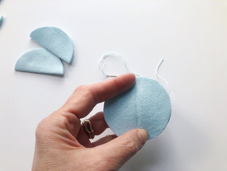 Sew across the entire fold mark and stop.  