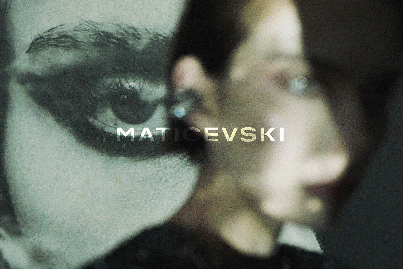 Close-up of a face painted white with black makeup on the eye, with a woman in the background, and the name 'MATICEVSKI' overlaid