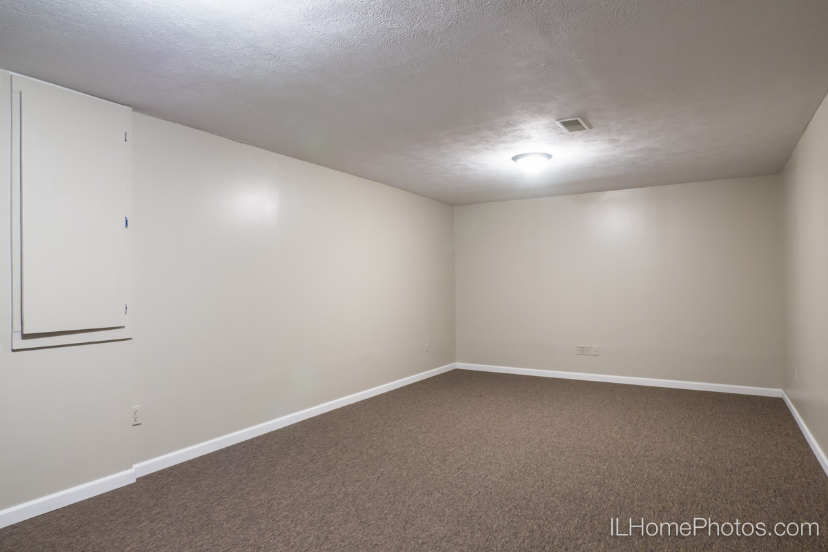 Interior basement family room photograph for real estate in Peoria, IL :: Illinois Home Photography by Michael Gowin, Lincoln, IL