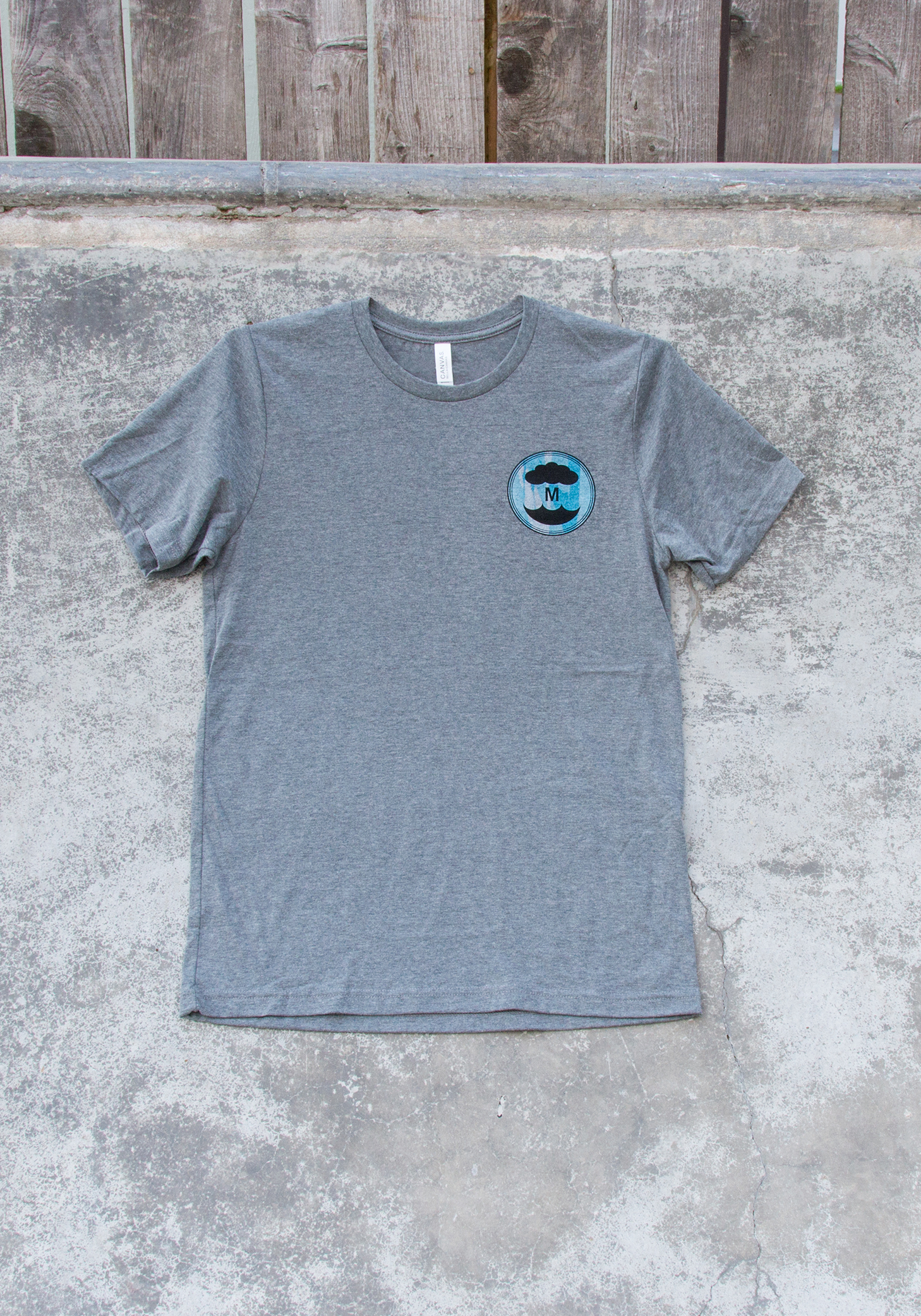 0014_grey_T_swirl_logo.png