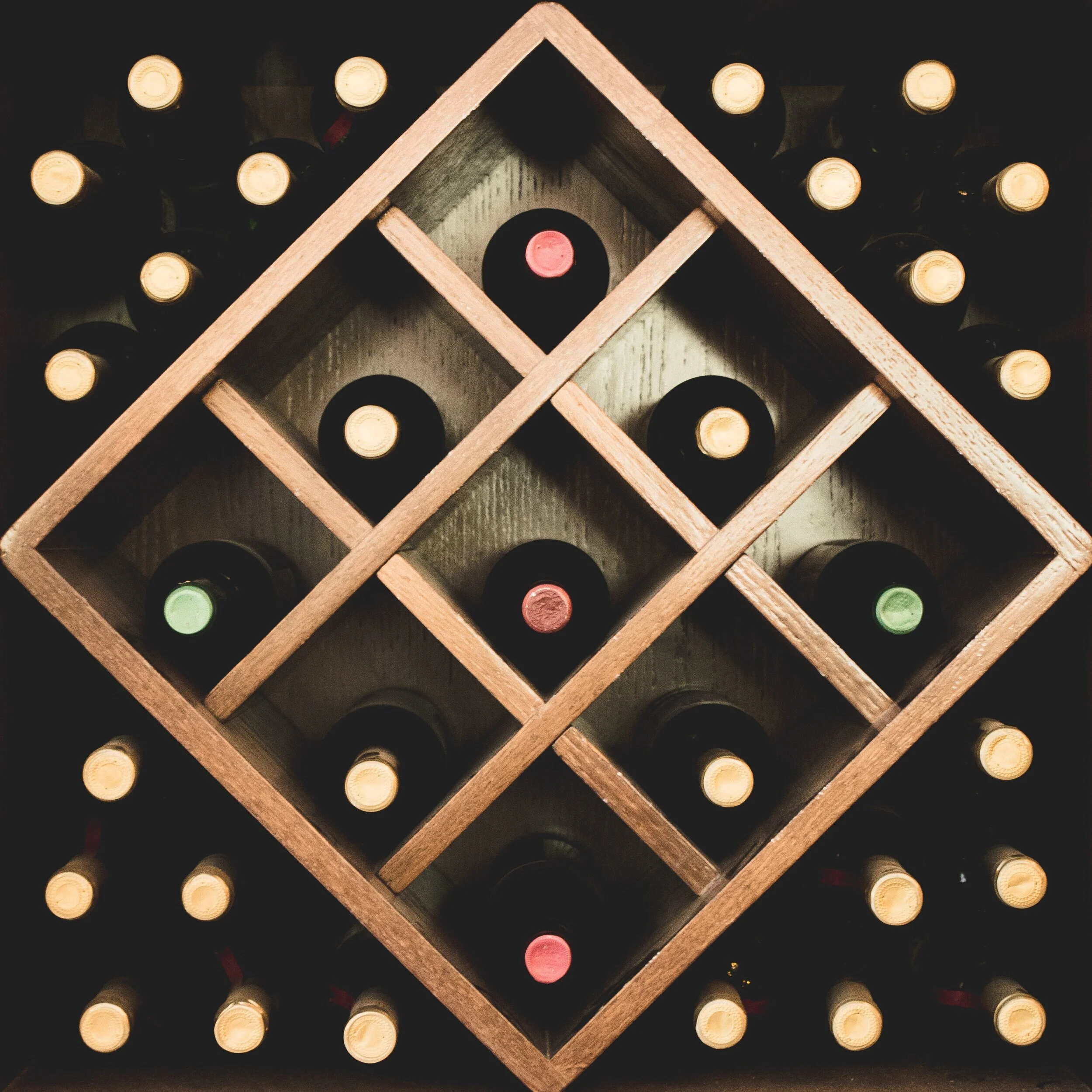 close-up-photo-of-brown-wine-rack-2909085.jpg