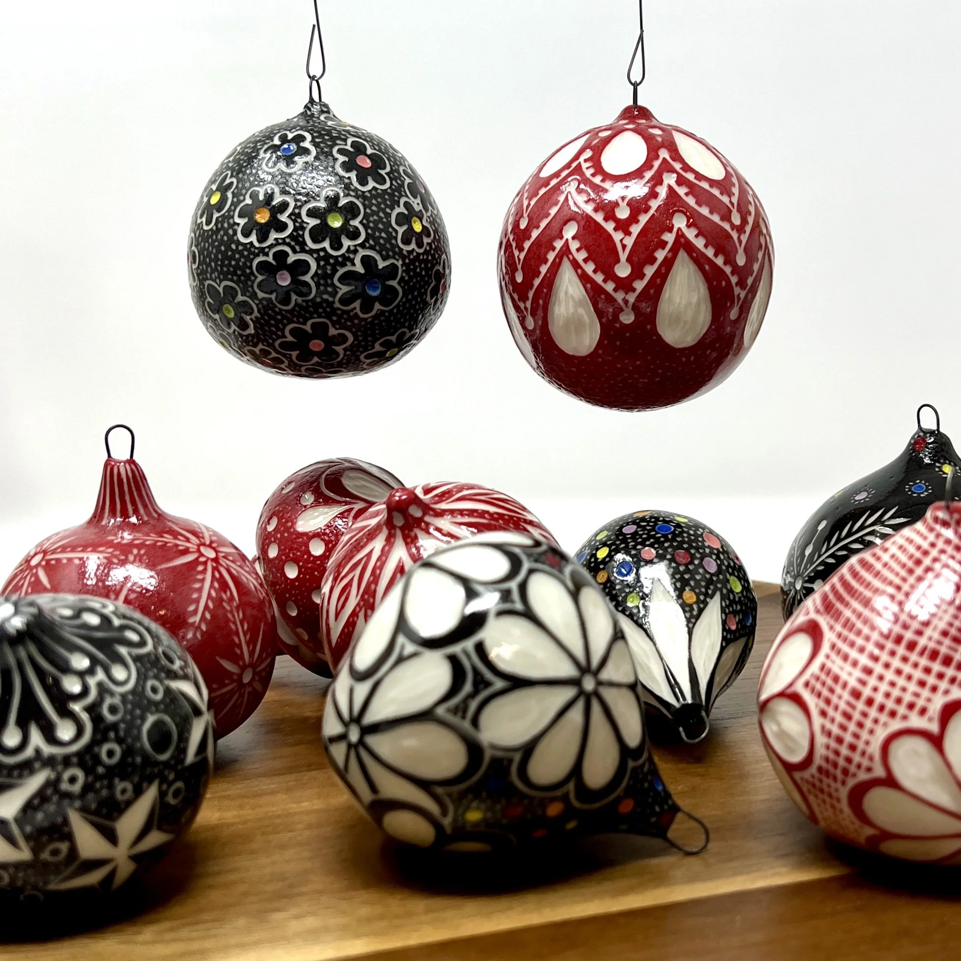 Hollow Bulb Ornaments. Sizes range from 2"-4" with weight up to 4oz. (Individual descriptions provided when shopping is enabled.)