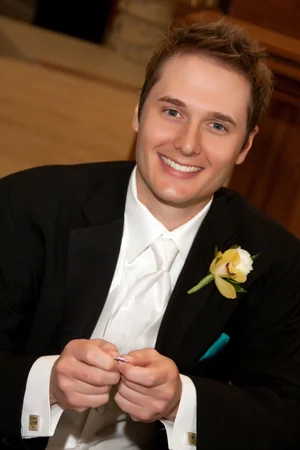 Happy Groom Holding the Ring