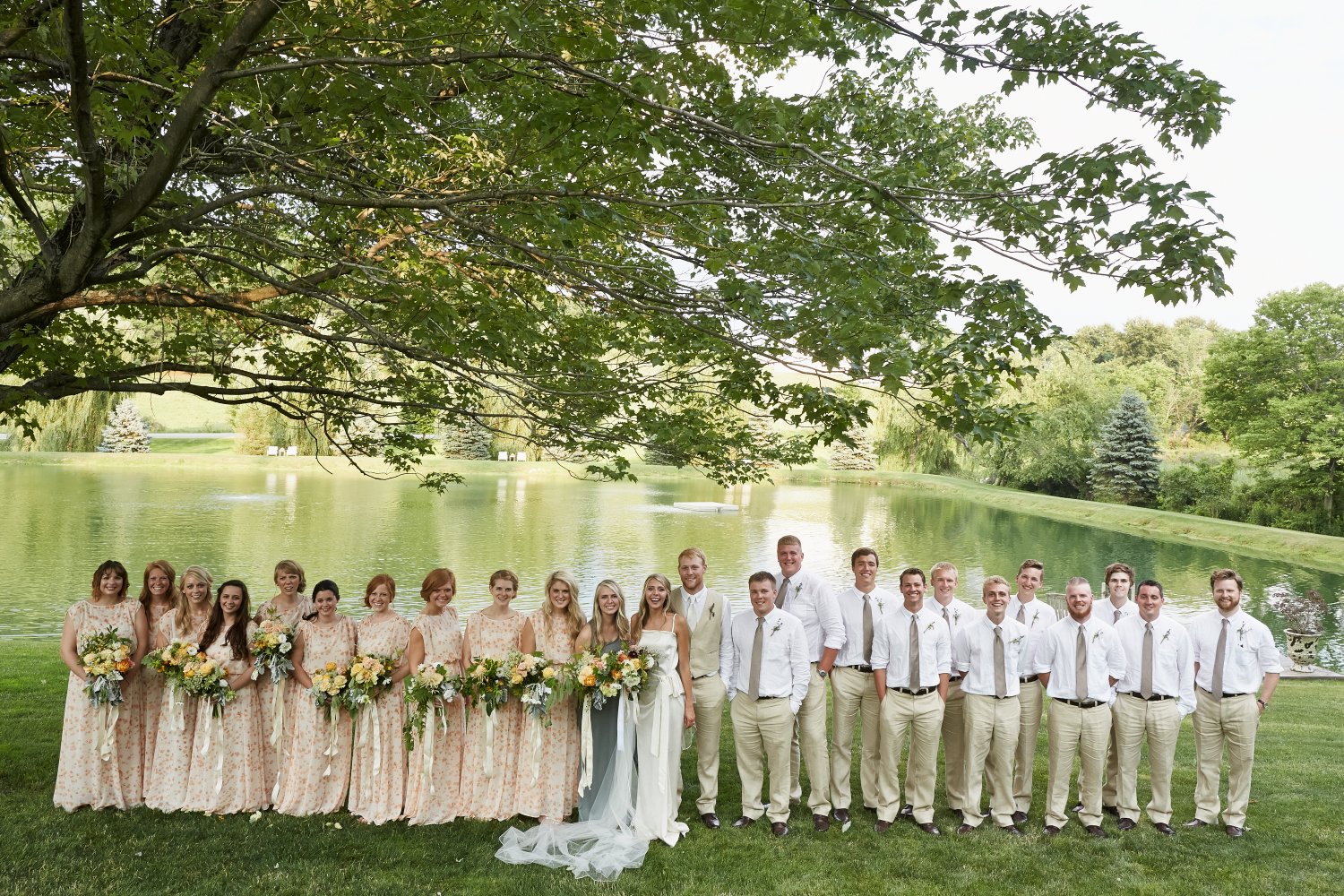 Normal
0
false
false
false
EN-US
X-NONE
X-NONE
There were 22 attendants at the wedding. That is a lot of bouquets and boutineers! The pallet was whites, yellow and peaches for the bridesmaids and a more colorful, wildflower bouquet for Rachel. We grew many of the flowers right on the bride's property. The groom and his groomsmen wore simple rosemary and lavender boutineers.
/* Style Definitions */
table.MsoNormalTable
{mso-style-name:"Table Normal";
mso-tstyle-rowband-size:0;
mso-tstyle-colband-size:0;
mso-style-noshow:yes;
mso-style-priority:99;
mso-style-qformat:yes;
mso-style-parent:"";
mso-padding-alt:0in 5.4pt 0in 5.4pt;
mso-para-margin-top:0in;
mso-para-margin-right:0in;
mso-para-margin-bottom:8.0pt;
mso-para-margin-left:0in;
line-height:107%;
mso-pagination:widow-orphan;
font-size:11.0pt;
font-family:"Calibri","sans-serif";
mso-ascii-font-family:Calibri;
mso-ascii-theme-font:minor-latin;
mso-fareast-font-family:"Times New Roman";
mso-fareast-theme-font:minor-fareast;
mso-hansi-font-family:Calibri;
mso-hansi-theme-font:minor-latin;}