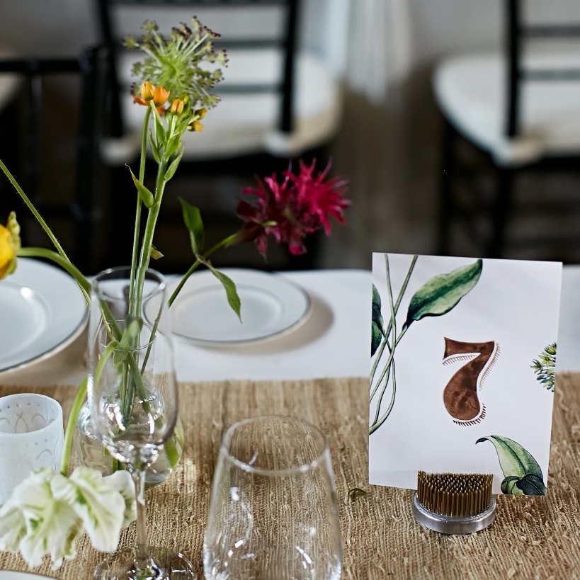 These floral frogs came from my personal stash and were the perfect stand for the table numbers. 