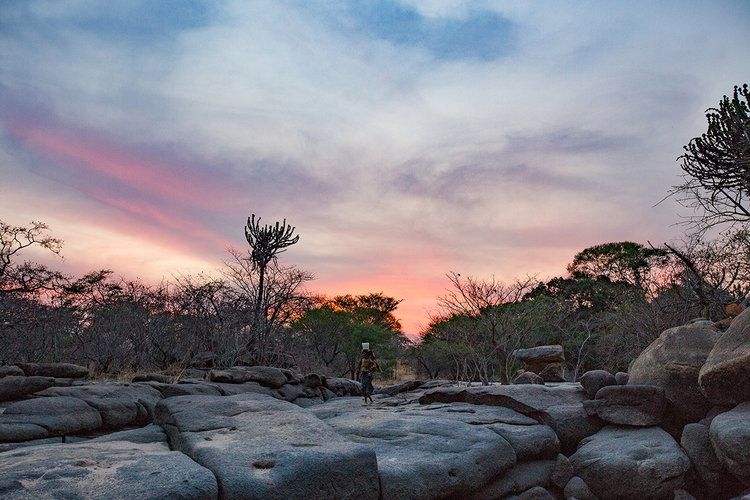 Carrying Water at Sunset by Andrea Griffiths, photographed in Tanzania.