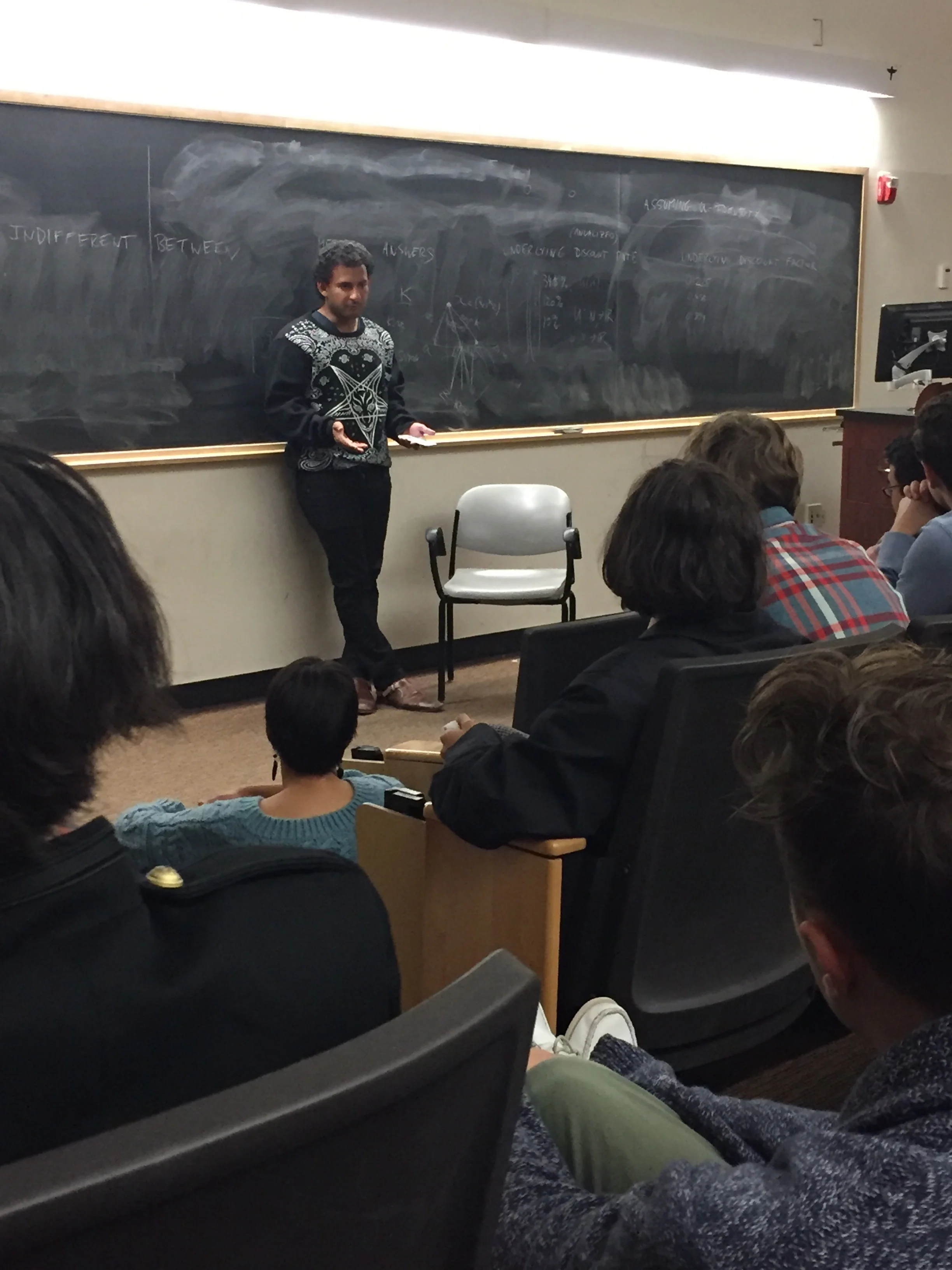 Iqram Magdon-Ismail, founder of Venom, speaking to students