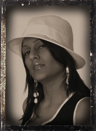 Renu_with_hat_close_bw.jpg