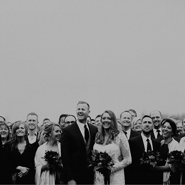 Outtake from a group photo of all their wedding guests post ceremony 🖤