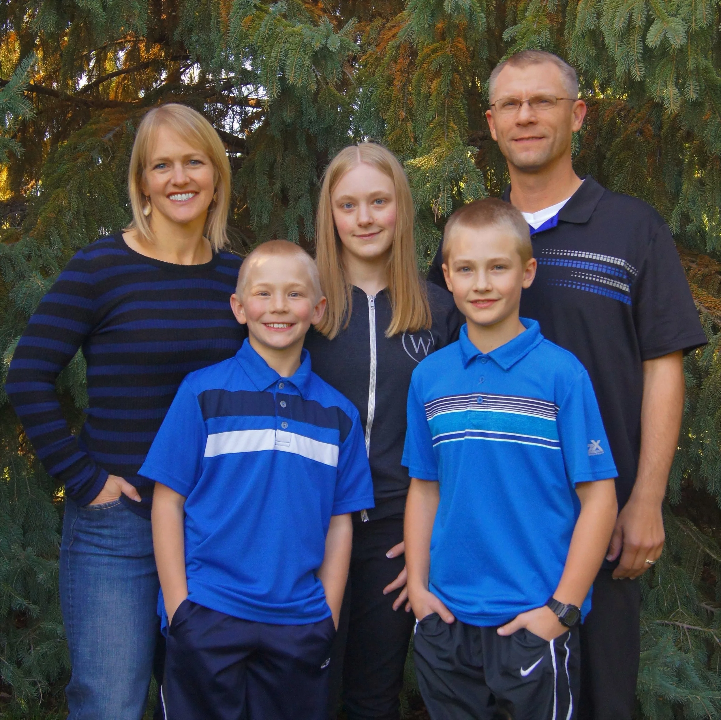 From top left: Kristi, Emma (16), Adam, Anthony (10), and Andruw (13). Photo by Carrie Schaefer.
