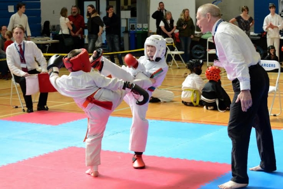 Head kicks a plenty during youth point-fighting divisions Don Osborne Photography