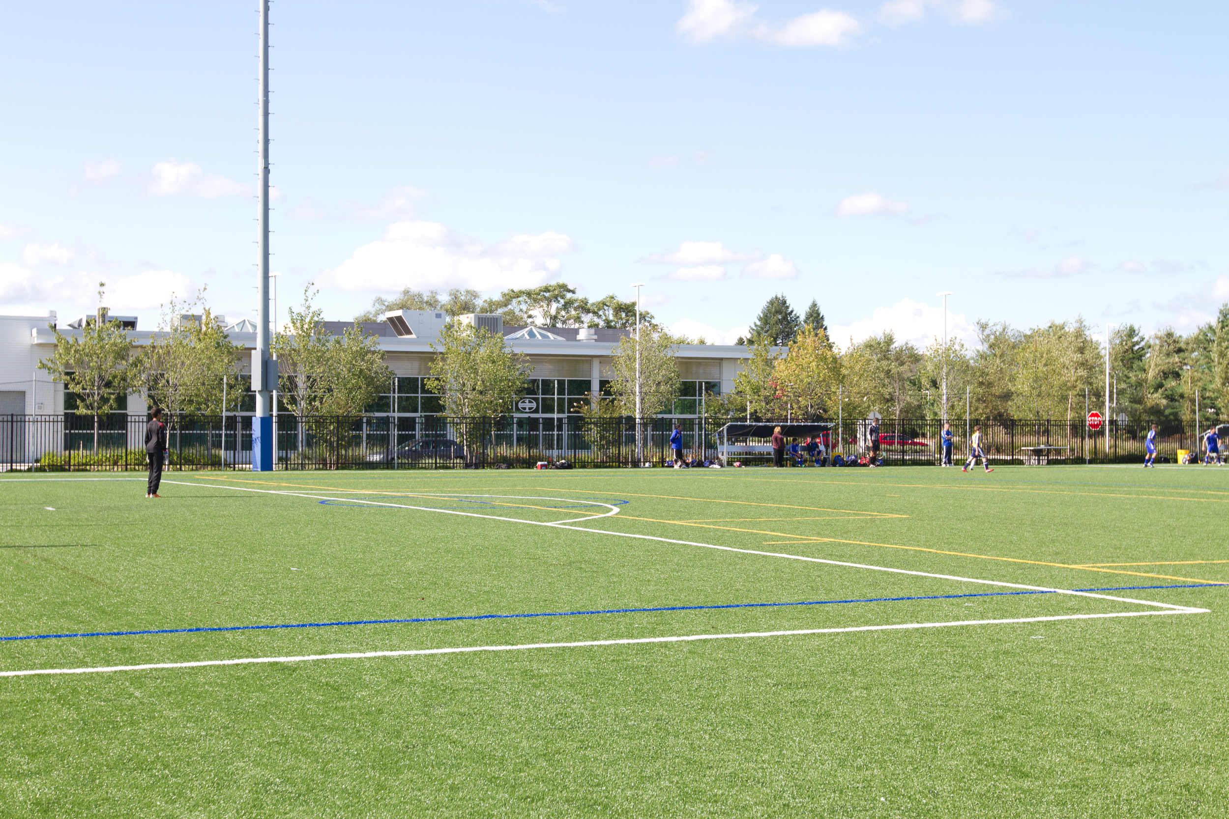 Adjacent to town of Oyster Bay athletic field for transition phase 3 rehab elite athlete.jpg