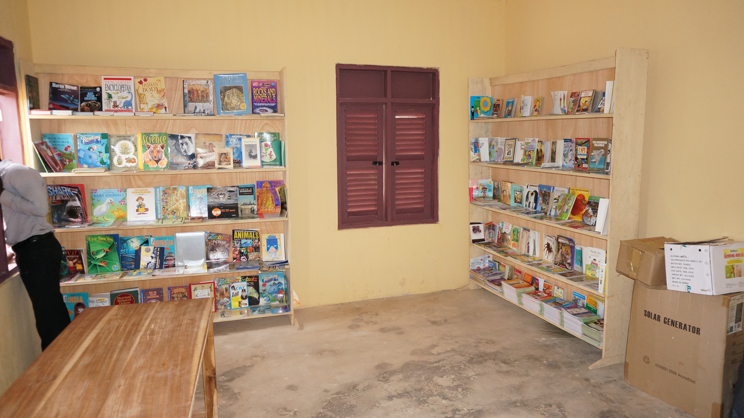 We provided shelves, tables, and 1000 books to fill school libraries.