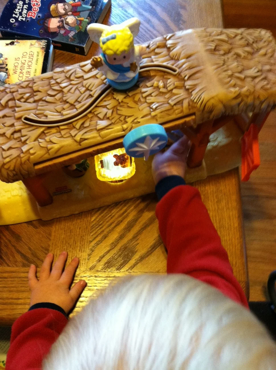 Ry playin with nativity.jpg