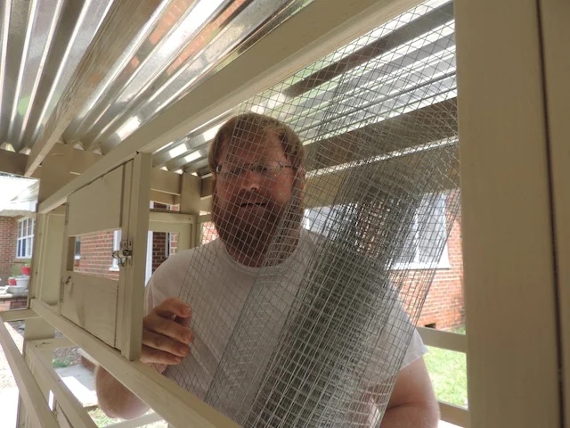 finishing touches to quail coop.JPG