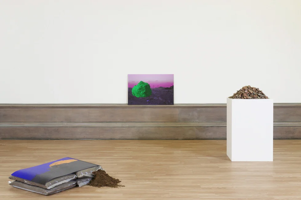 Experiments in Diasporic Space II, Narratives of Conflict and Longing (Colourspace), digital print, building sand, plywood, rubble, plinth, 2014 @Sulaiman Majali (A collaboration with Sharif Elsabagh ) 