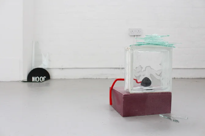 Circles connecting with collapsed time, mirror, broken glass fragments, half cut sign board, black sponge ball, plaster block, glass brick, hoop, etc, 2015 @DongKwang Jo