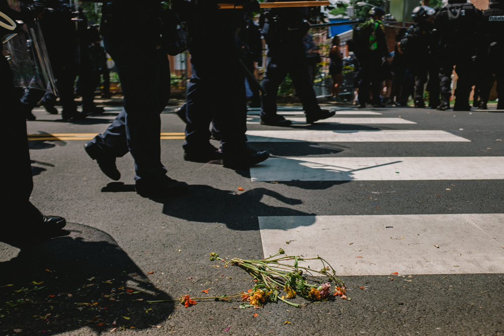 Police officers dressed in riot gear march forward as they push protesters away from Emancipation Park after Virginia Governor Terry McAuliffe declared a state of emergency on August 12. (Seth Herald / The Atlantic)