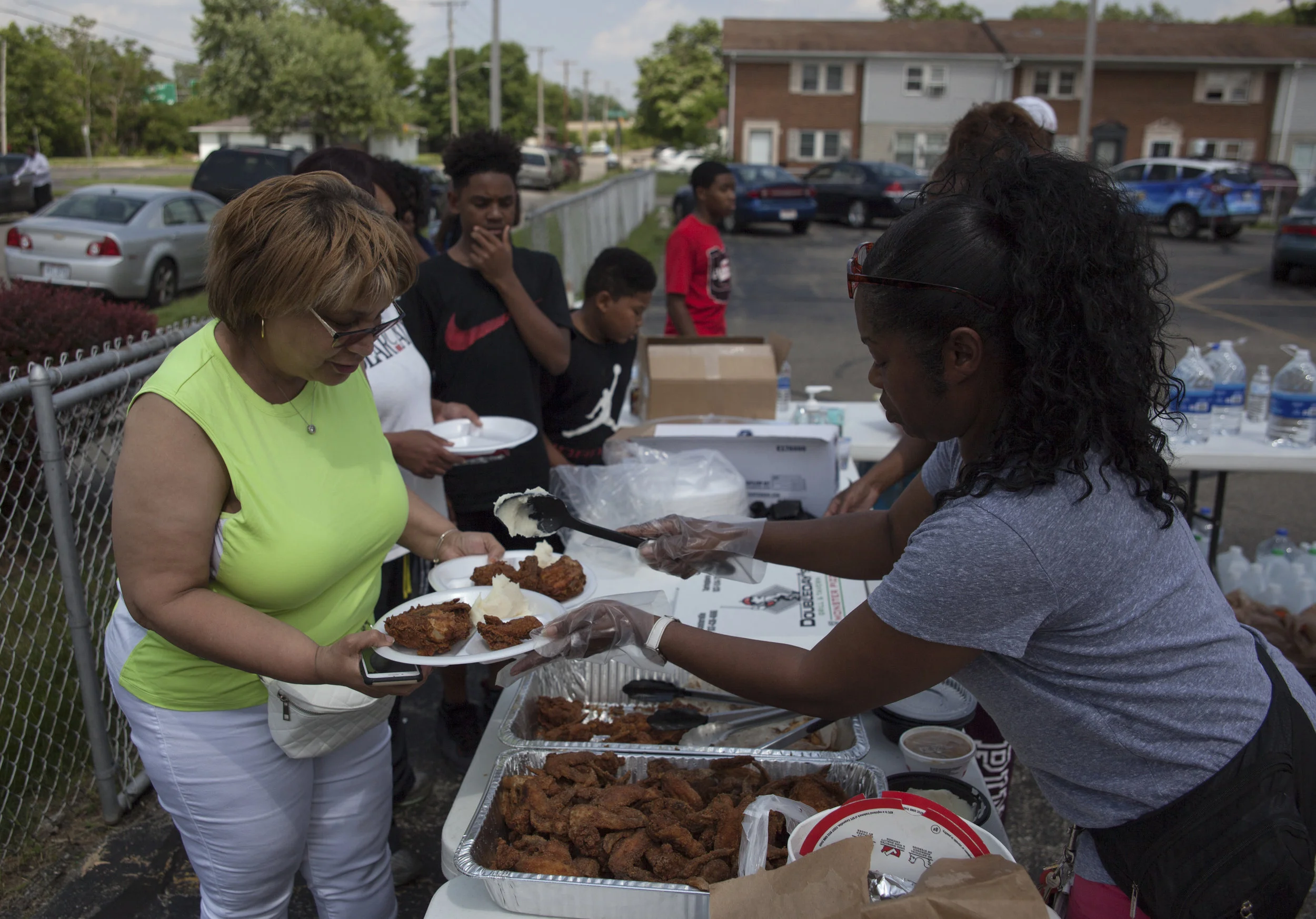 Corinthian Baptist Church members help tornado victims in Dayton, Ohio on May 28, 2019, after powerful tornadoes ripped through the US state overnight, causing at least one fatality and widespread damage and power outages. - One fatality has been reported so far, an 81-year-old-man in Celina, Ohio, which is about a 90-minute drive north of Dayton, said Celina Mayor Jeffrey Hazel. (Seth Herald / AFP)