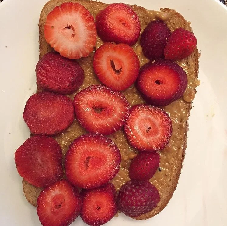 Whole grain bread, peanut butter, strawberries