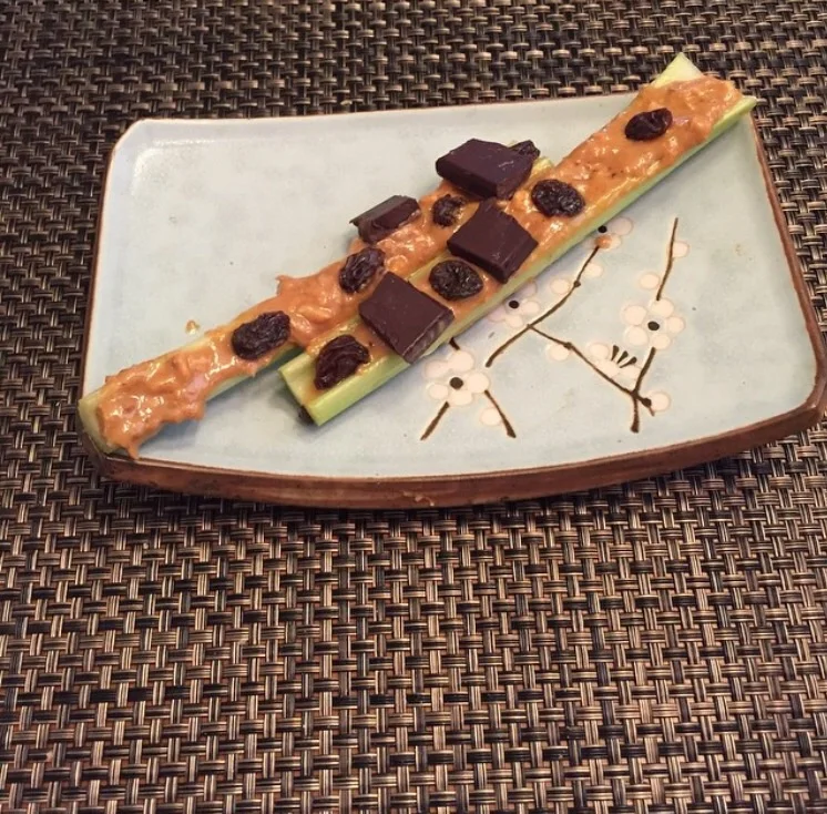 Celery, peanut butter, raisins, dark chocolate