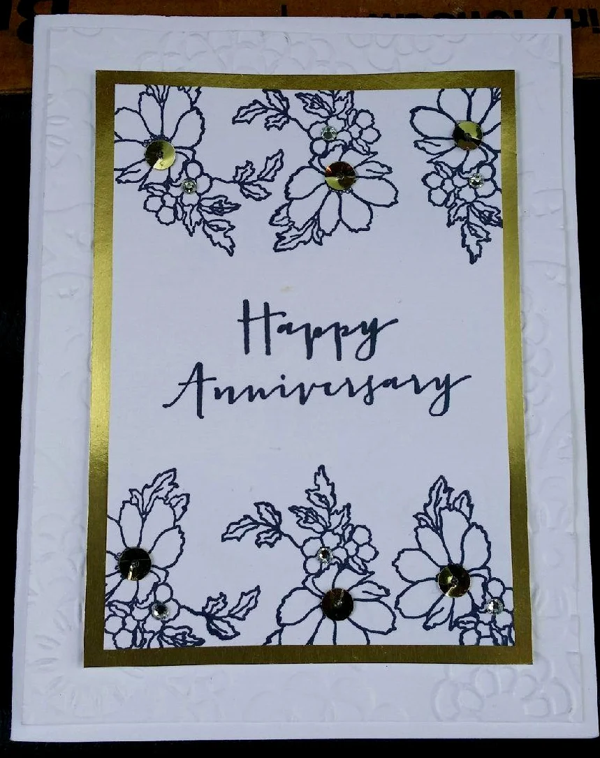 This anniversary card was my favorite of this month's stack. It was created using the Timeless Love stamp set and is embellished with gold sequins and jewel rhinestones.