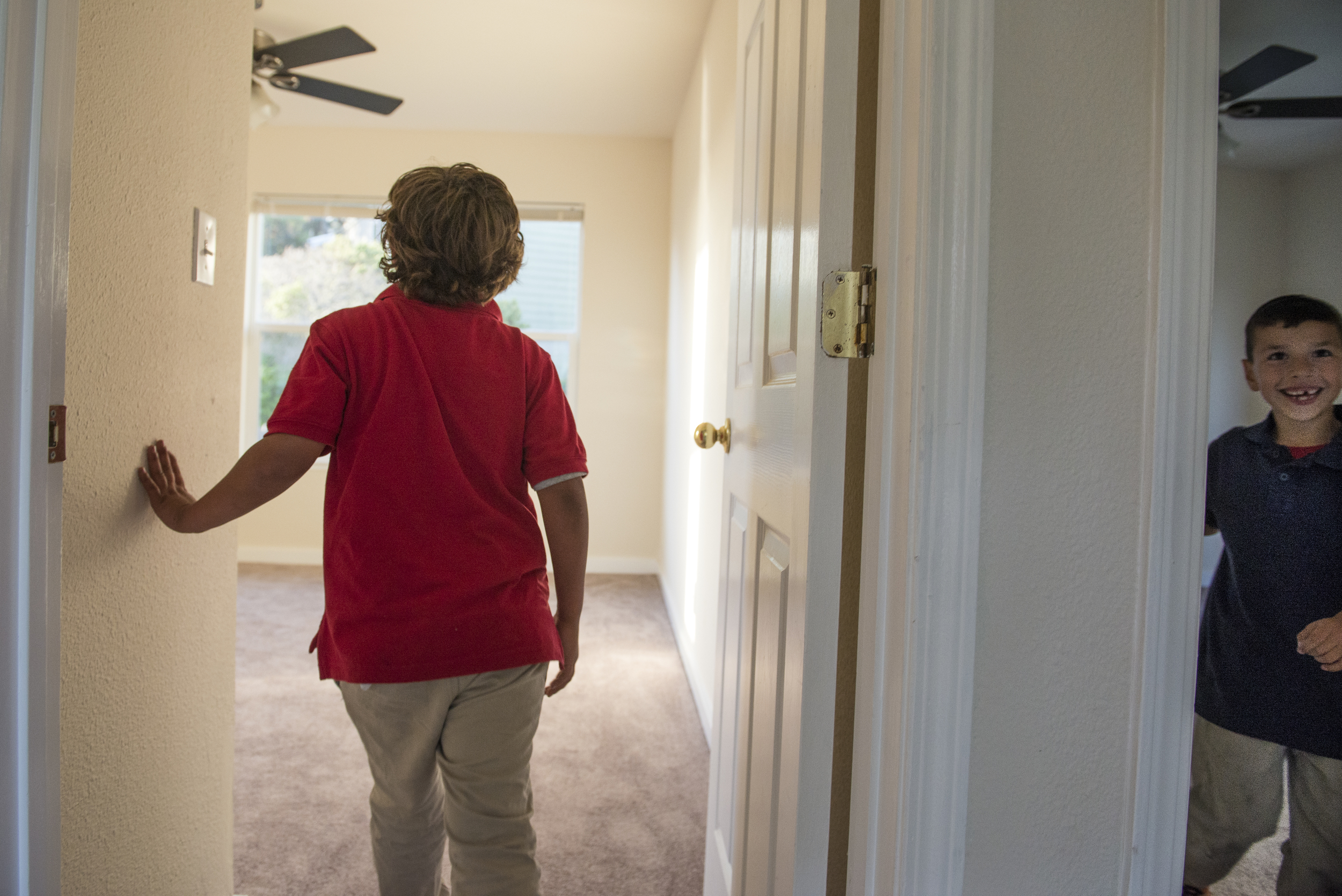  Christopher and Mateo explore their new home for the first time. 