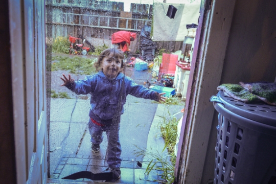 Dominique, 2, walks in the door of his home on the outskirts of San Francisco, CA.