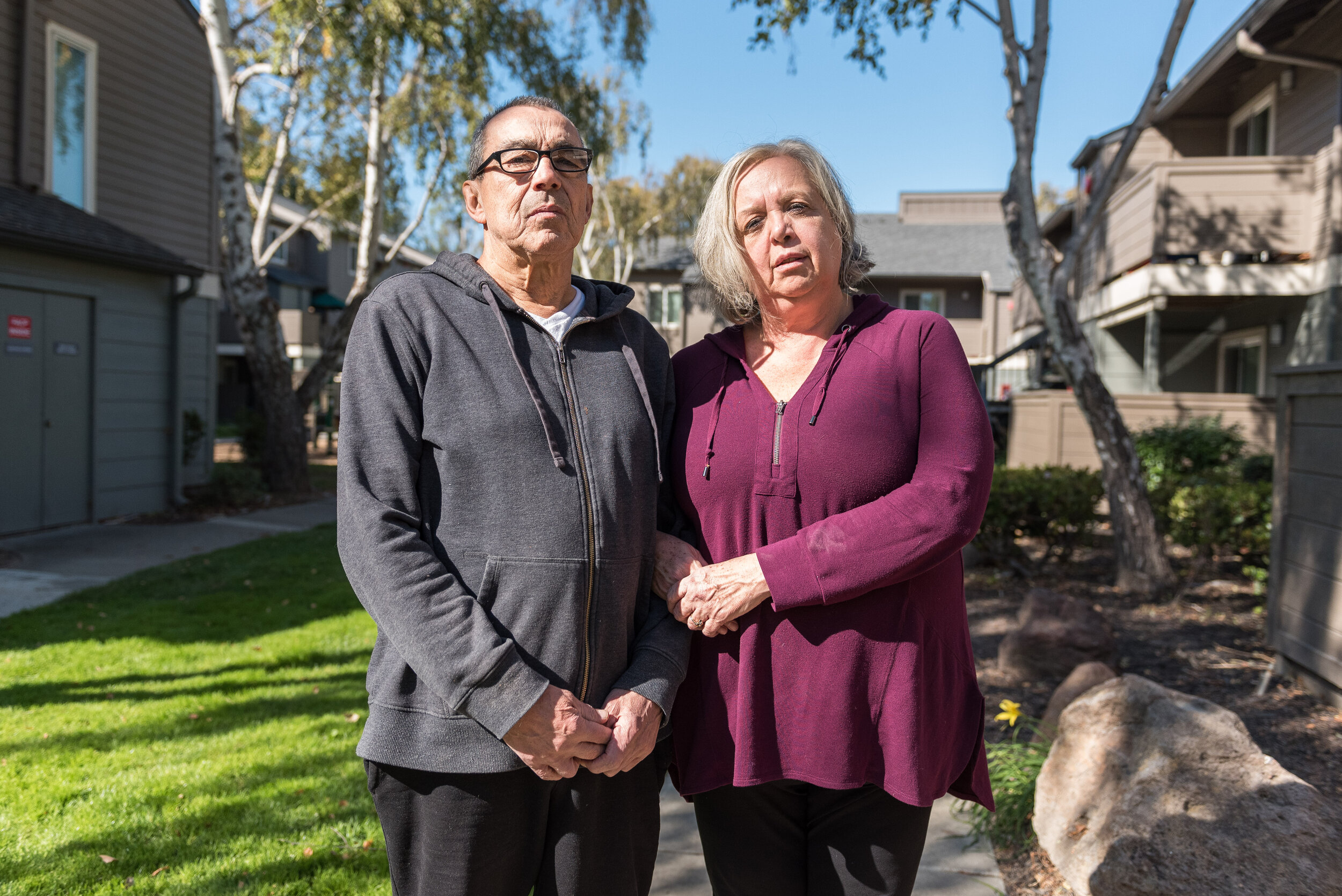  John Flores and Manon Demers in the courtyard of the apartment complex where they moved after the flood. “Nobody ever came to tell us to evacuate. On top of loosing most of our possessions, the hardest thing has been not knowing if we were ever safe