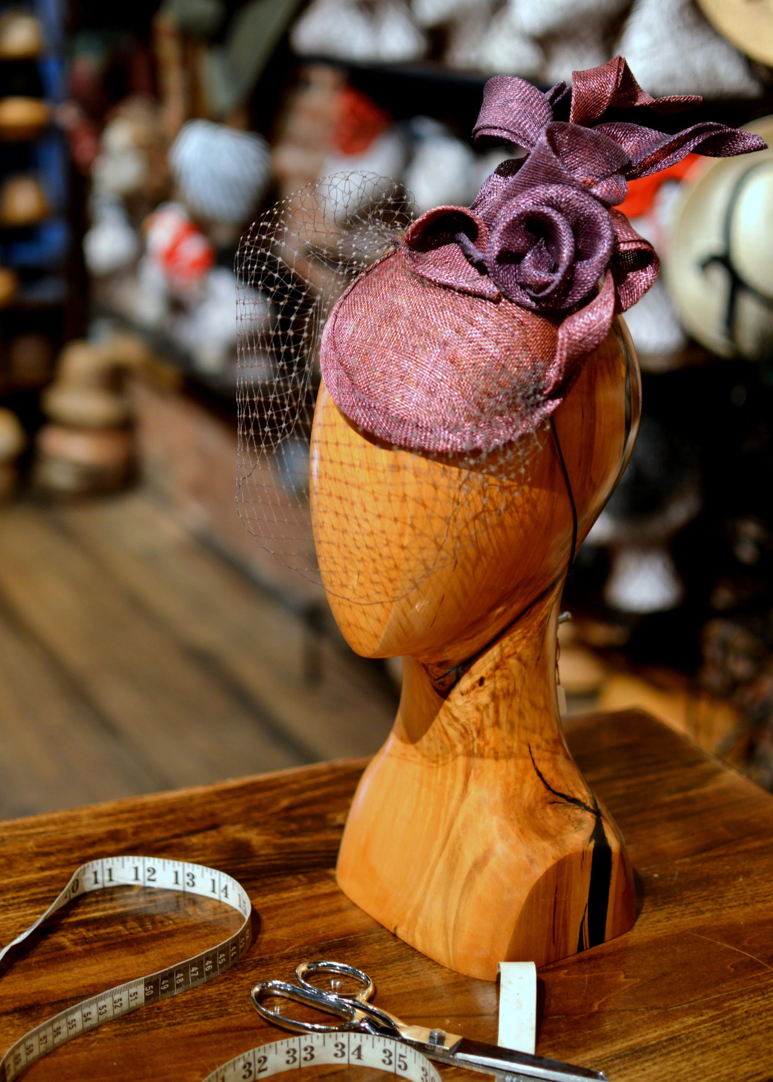 Floral sinamay fascinator wine.jpg