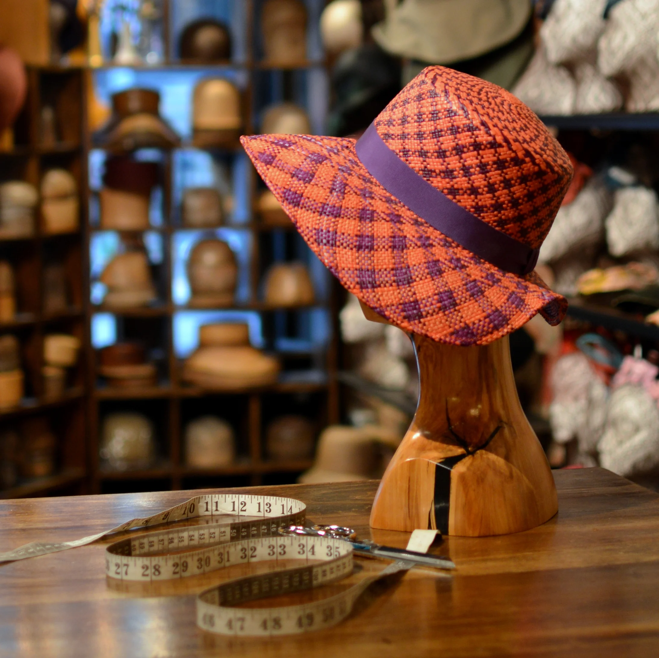 Monaco in panama - Dramatic fifties style with cut away back for comfort in dramatic orange and purple handwoven panama straw side