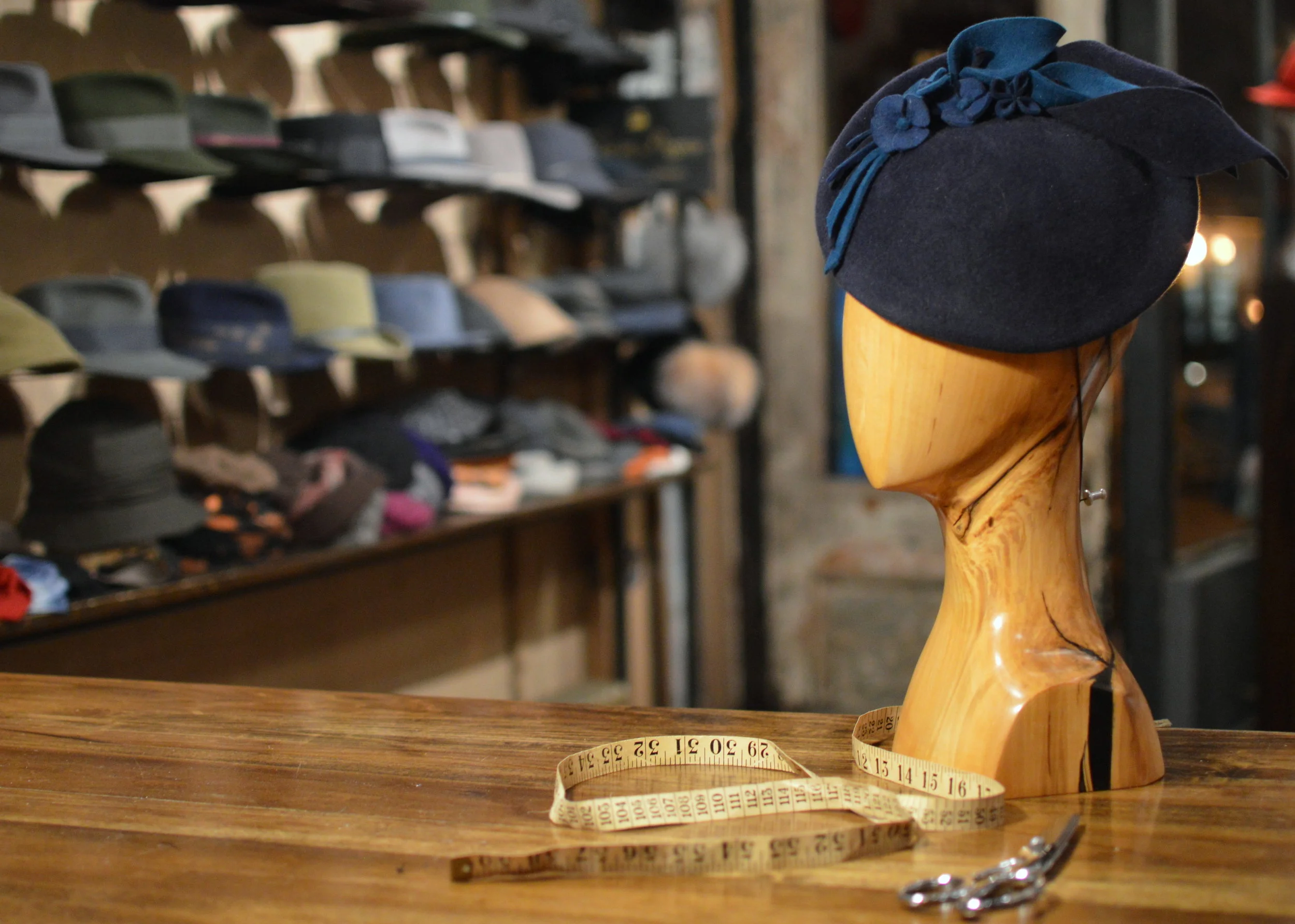 Duchess in Navy - Classic profile hat in navy with turquoise and navy sculpted flowers.