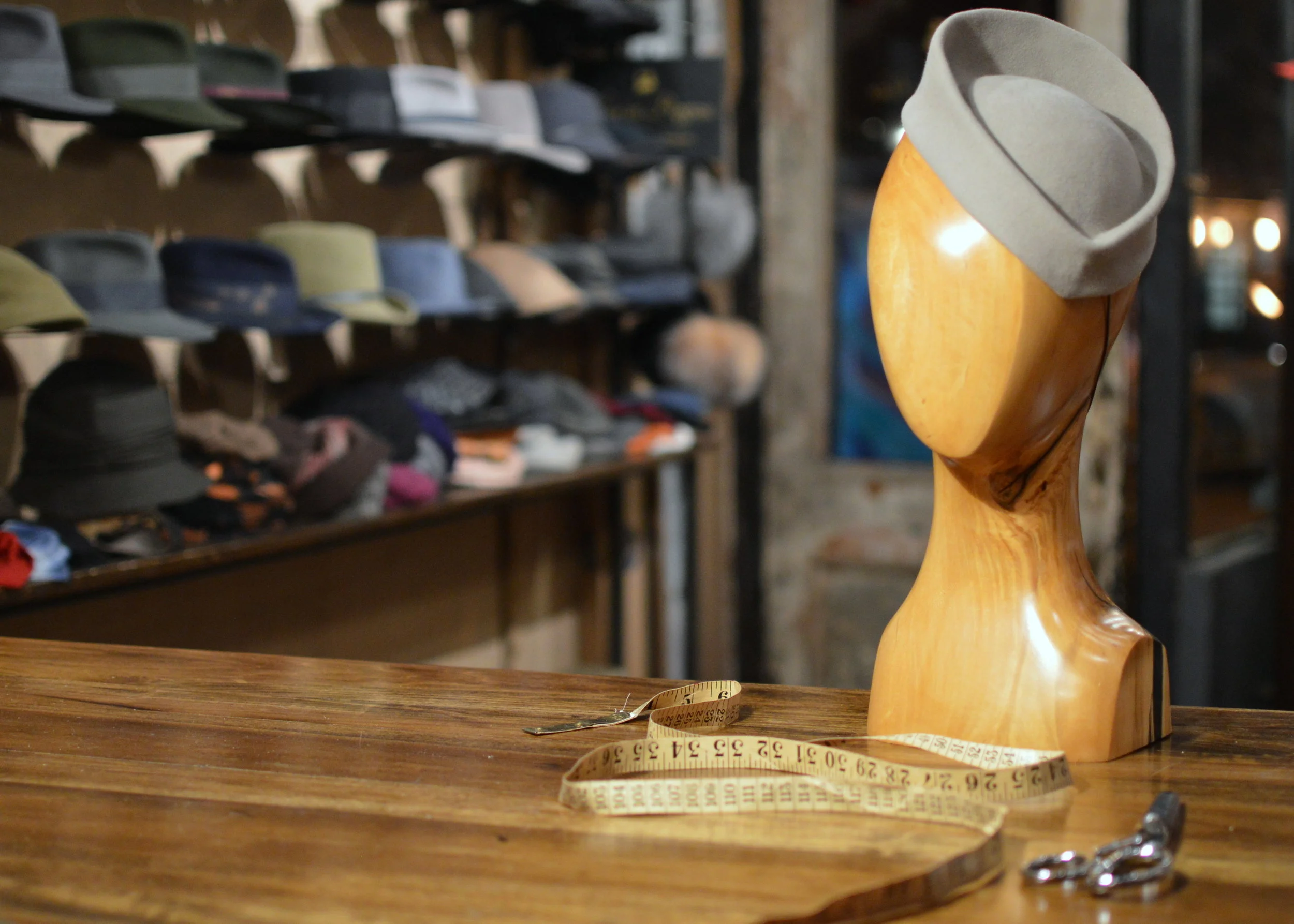 The Metropolis in grey is a hand draped felt cocktail hat