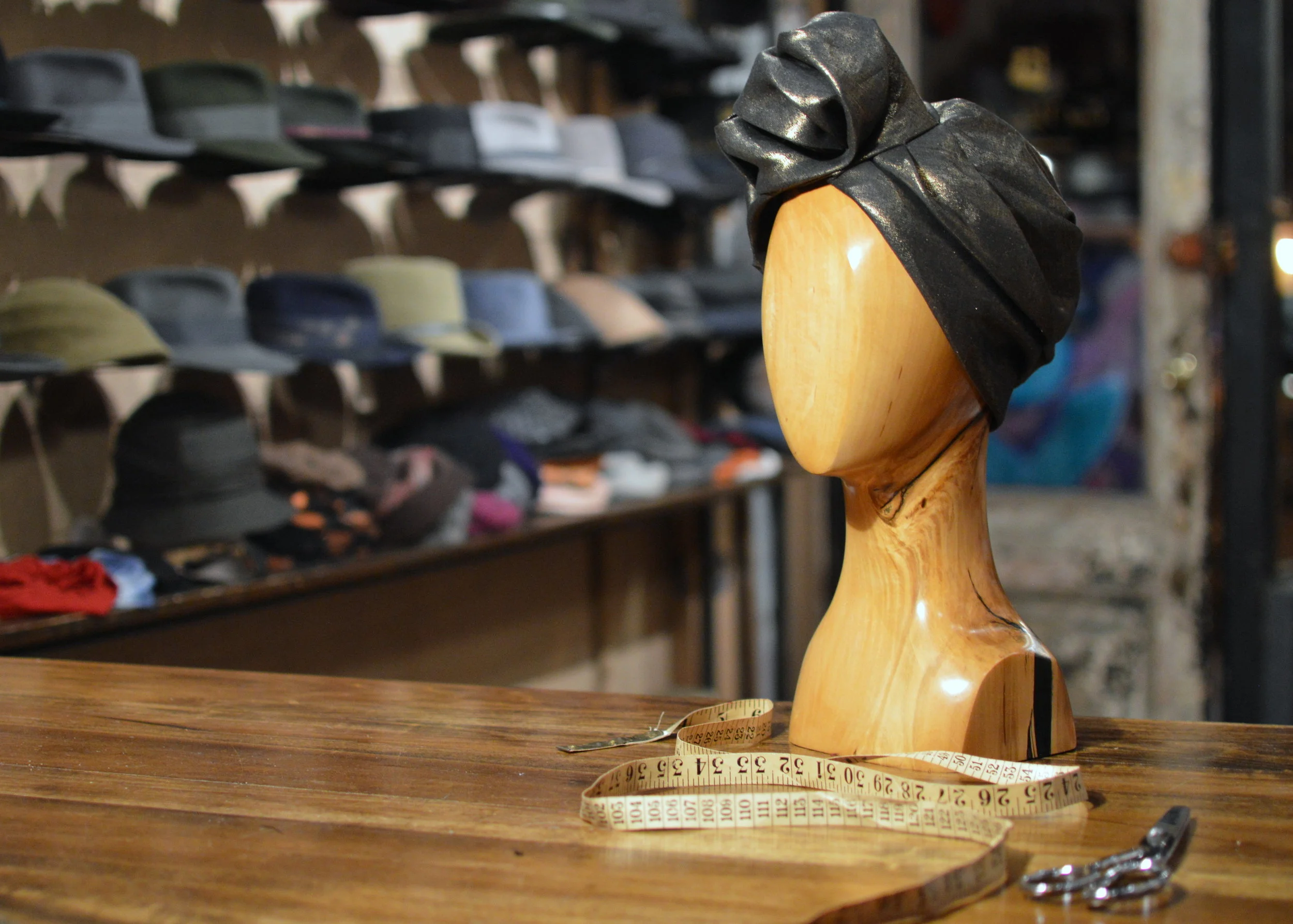 The Gold Linen Turban is hand draped in a luxurious material side