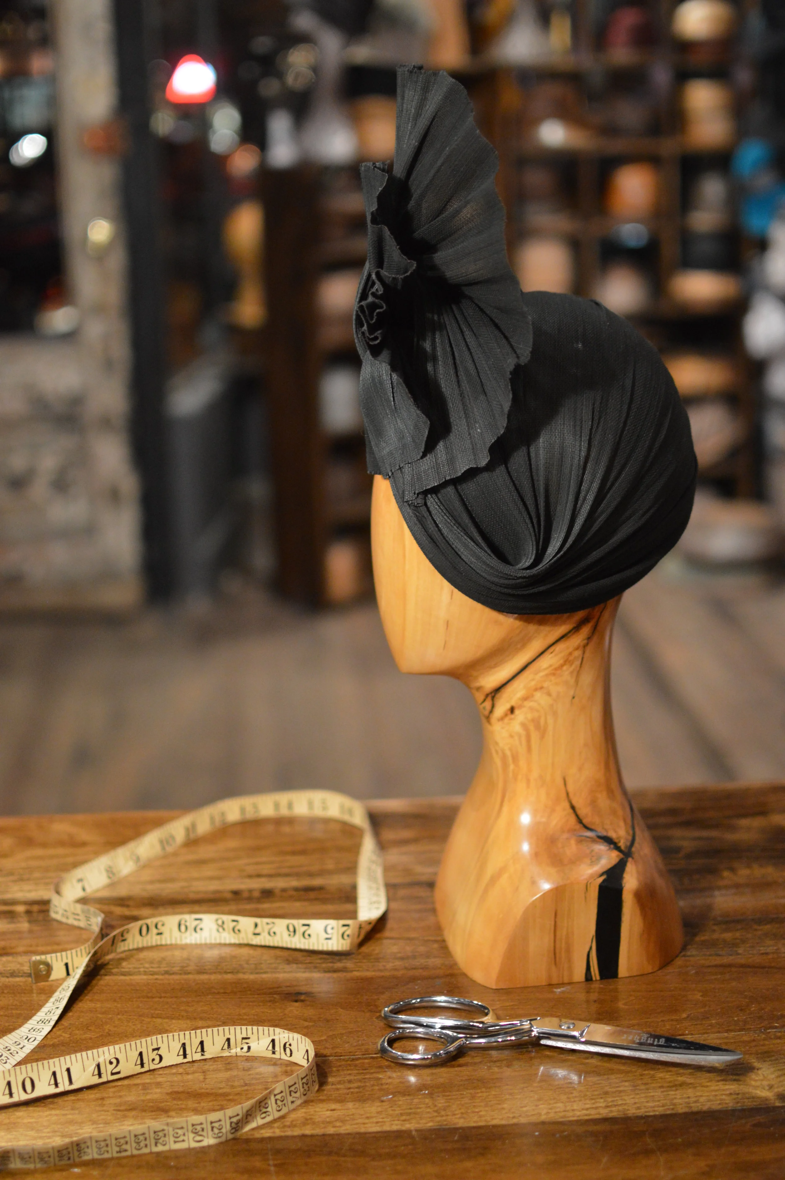 Jinsin Turban - Deco inspired turban in black jinsin, crisp, elegant and showstopping side