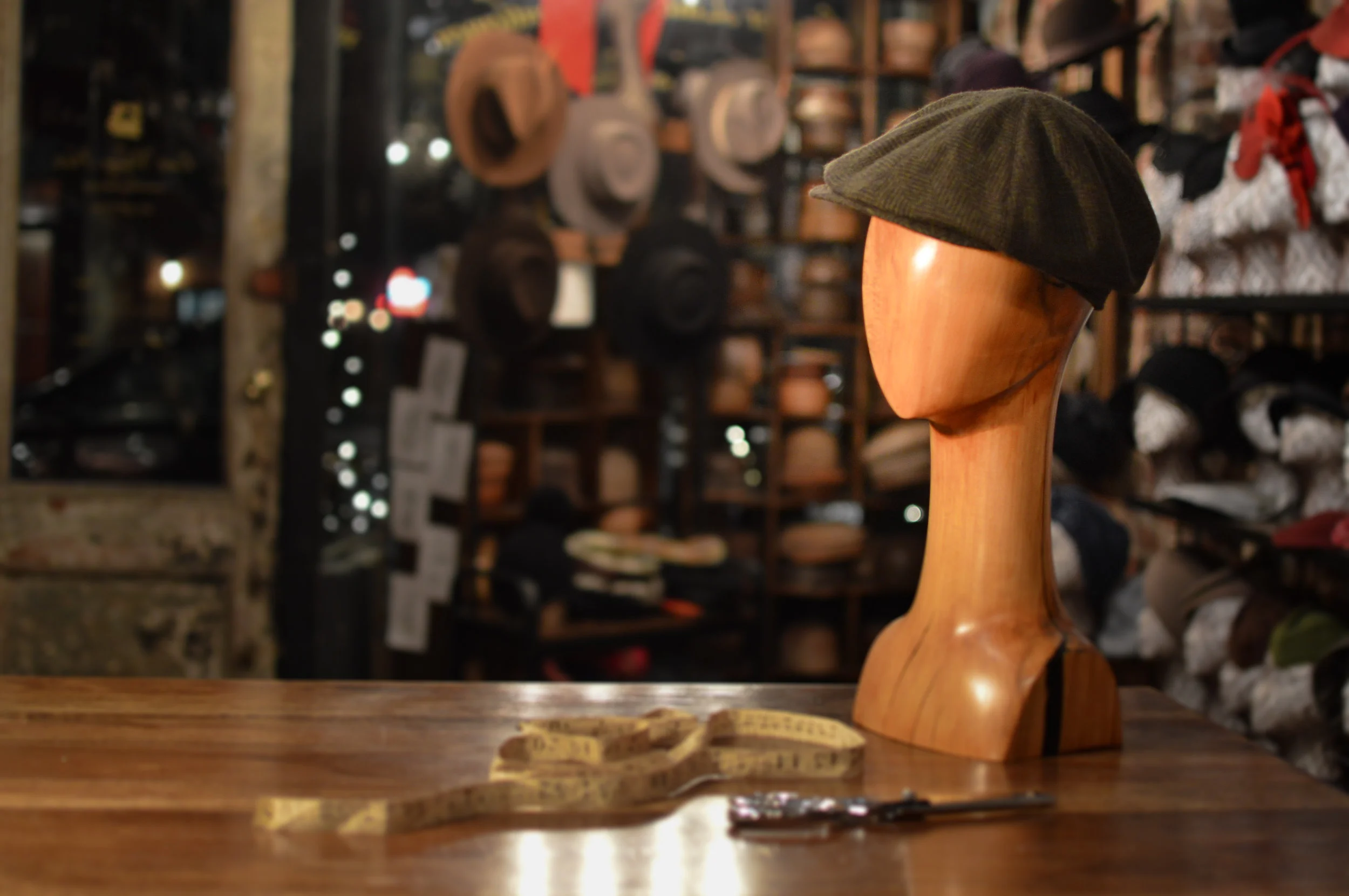 A classic Newsboy Cap in Green Herringbone handmade by Laura Catignani