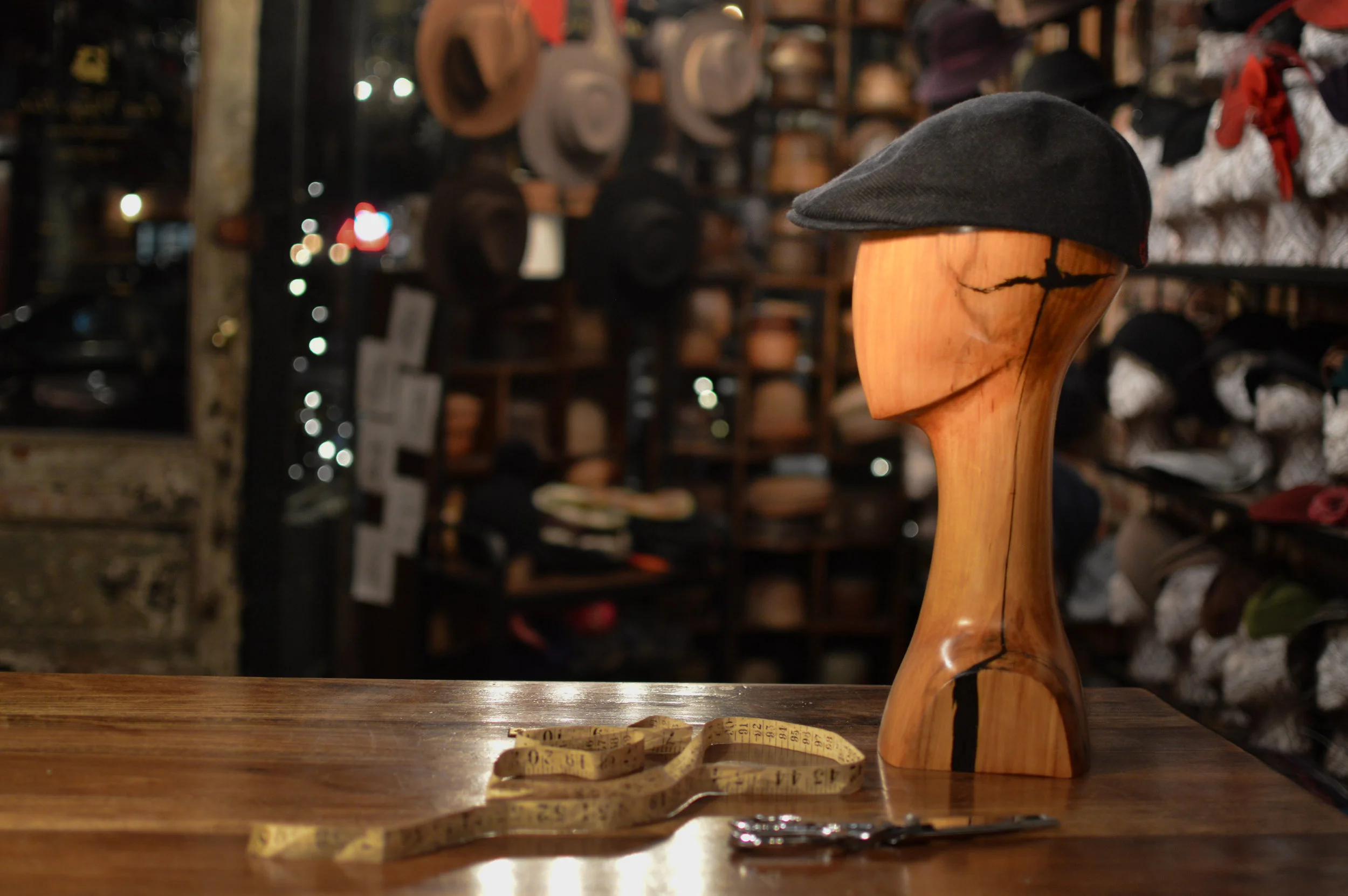 A classic Driver Cap in black Cashmere handmade by Laura Catignani.