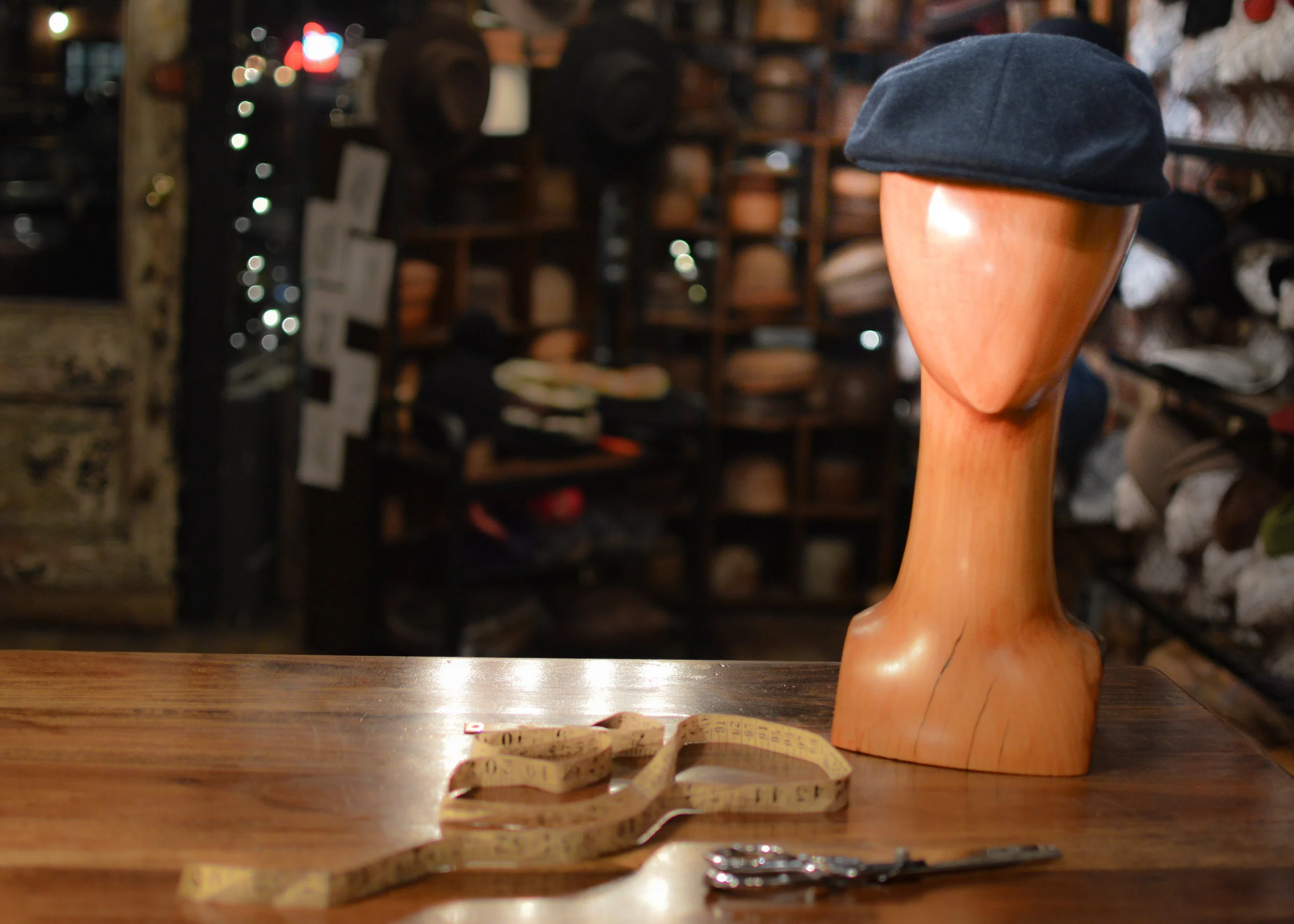 A classic Driver Cap in Teal, handmade by Laura Catignani