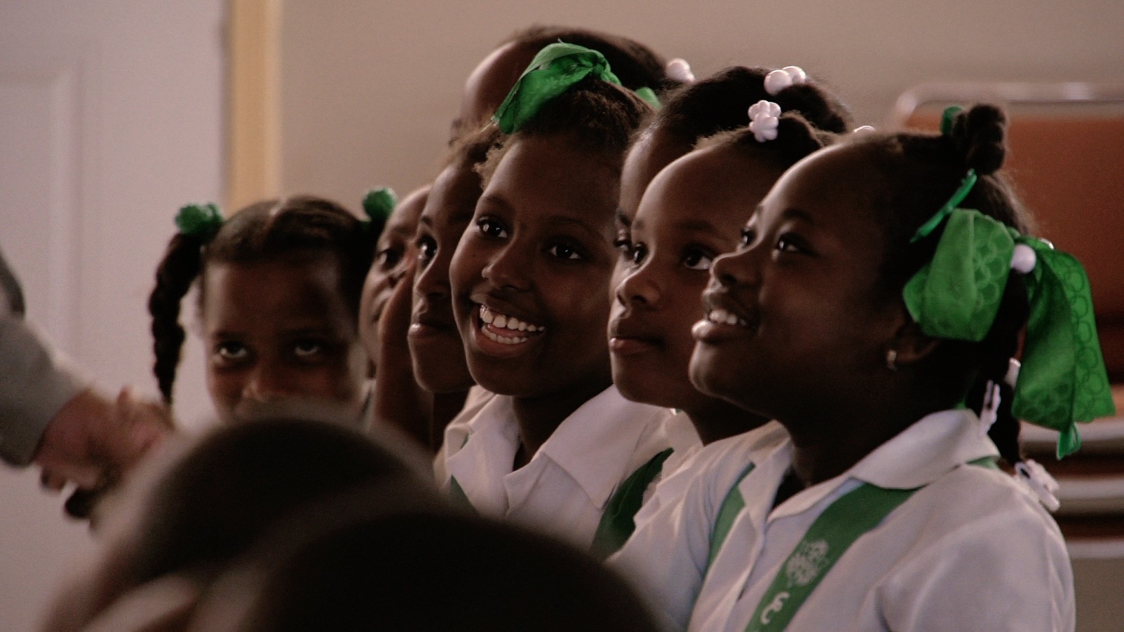 Pew of smiling schoolgirls.jpg
