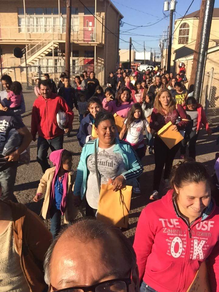 Susan Hellums shares - This was a picture posted on Facebook from Eli who coordinates work at Sacred Heart HRC. Eli is in very front and posted "just another day at the office." We give about $500 worth of food a week to Center. They called me today for deodorant and toothpaste. Unfortunately, I didn't have funds. They saw over 300 through today. #'s have been up again for 2 months or more. 