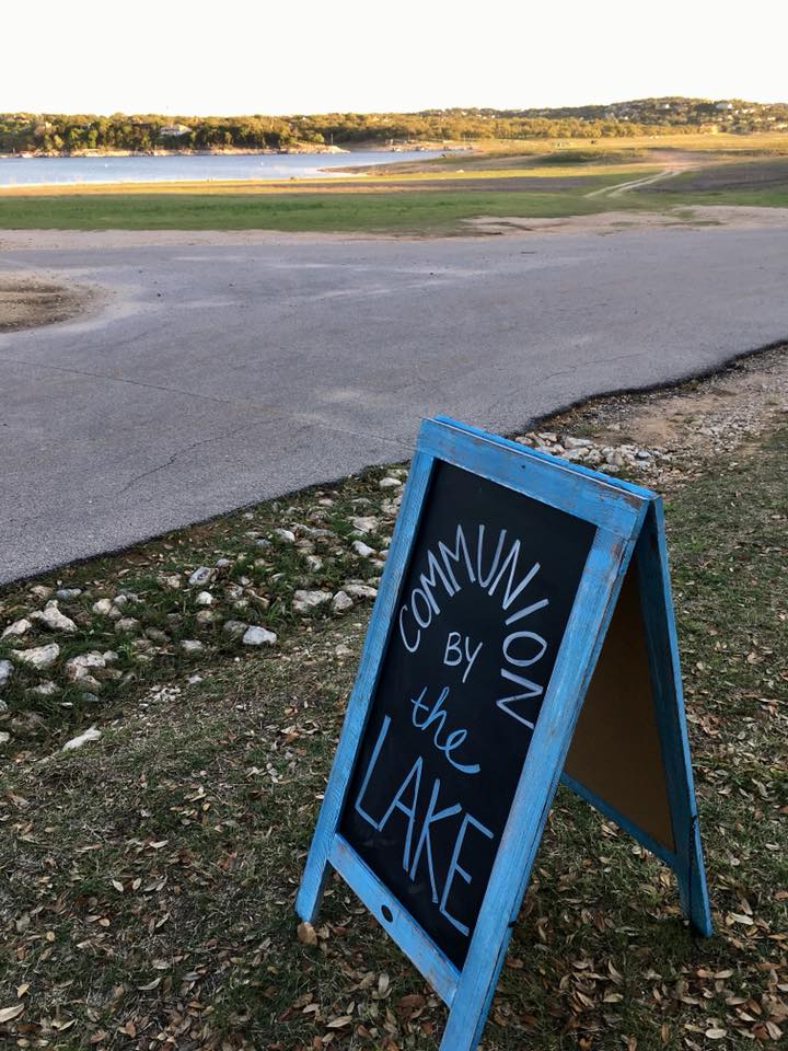 A welcome sign greets visitors to Pace Bend Park for Bee Creek UMC's communion by the lake.