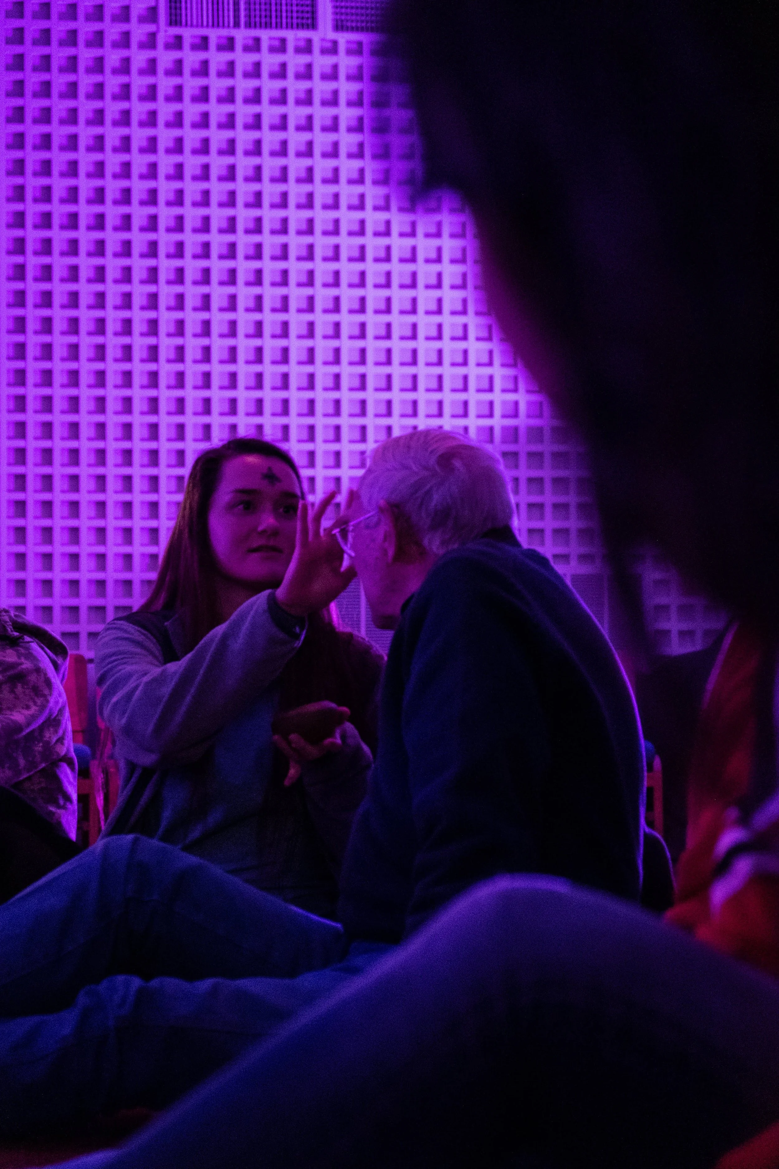 Texas State students receive and share ashes during Ash Wednesday worship at the United Campus Ministry. Photo credit: Tania Zapien