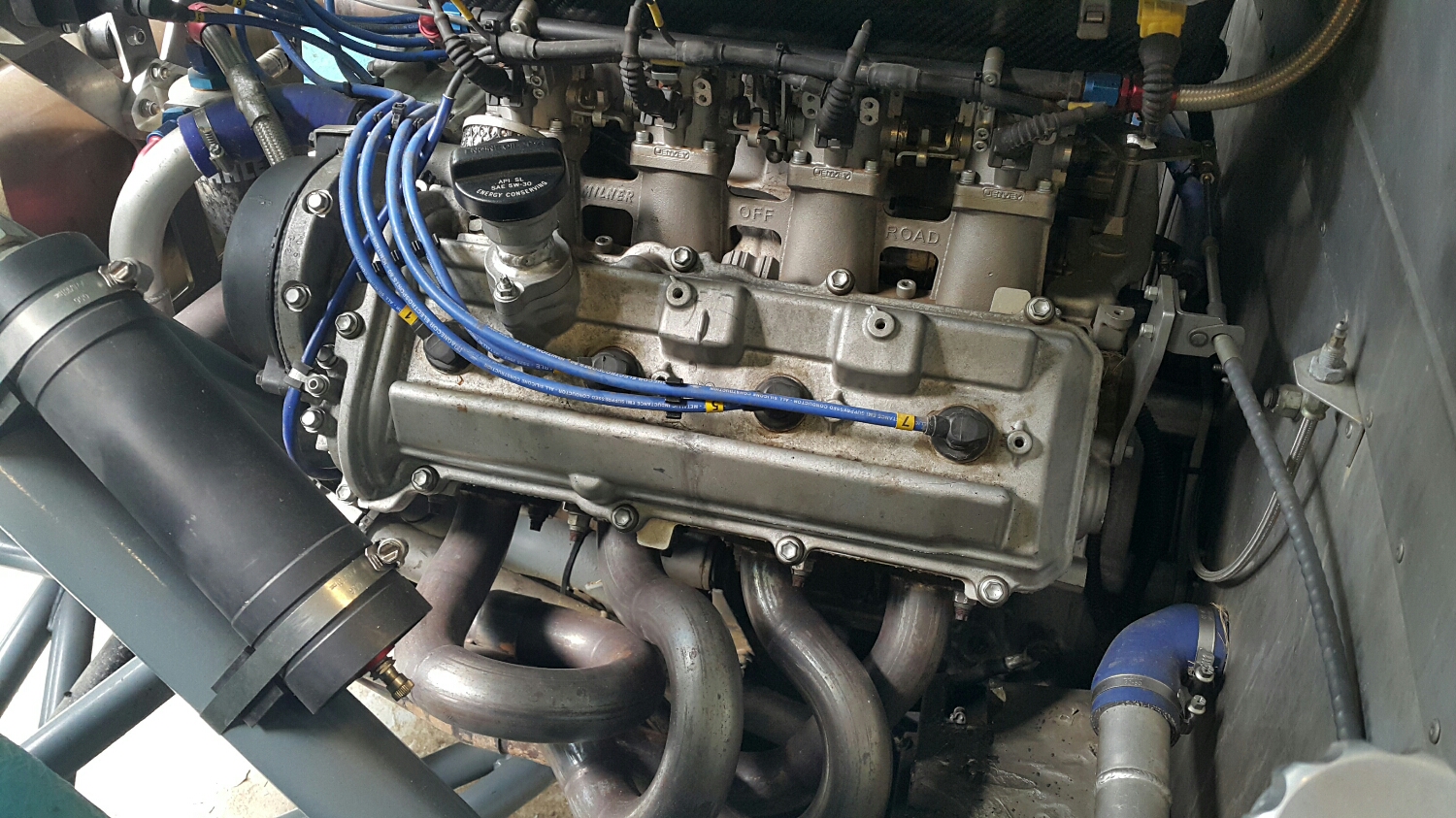 Milner sand cast intake with 8 individual throttle bodies. AWESOME