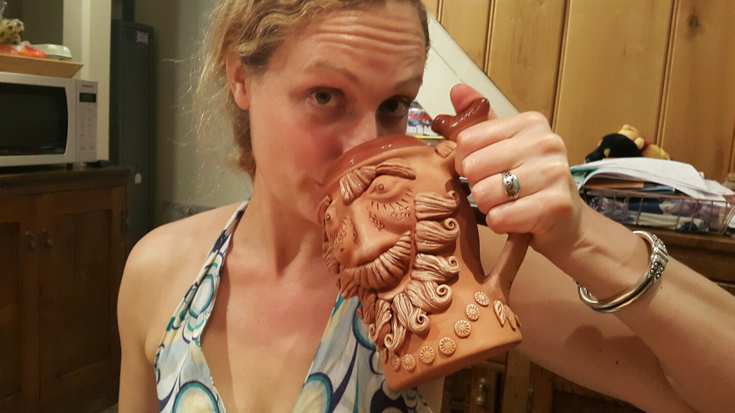 Miss Alice drinking from a beer mug that Peter got for his Birthday. 