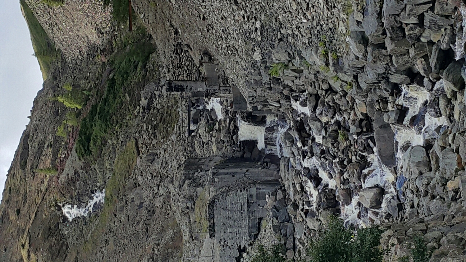 Wow, finally made it to the bottom. This is an old slate quarry.