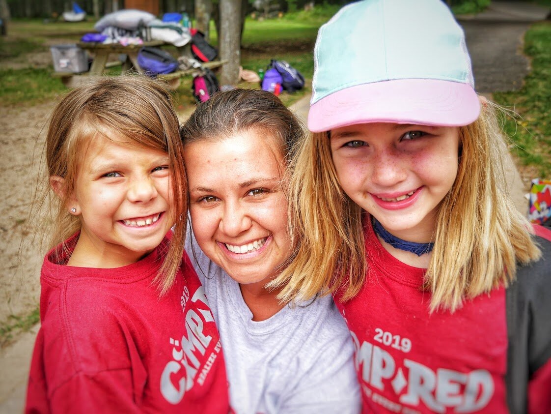 counselor and 2 campers.jpeg