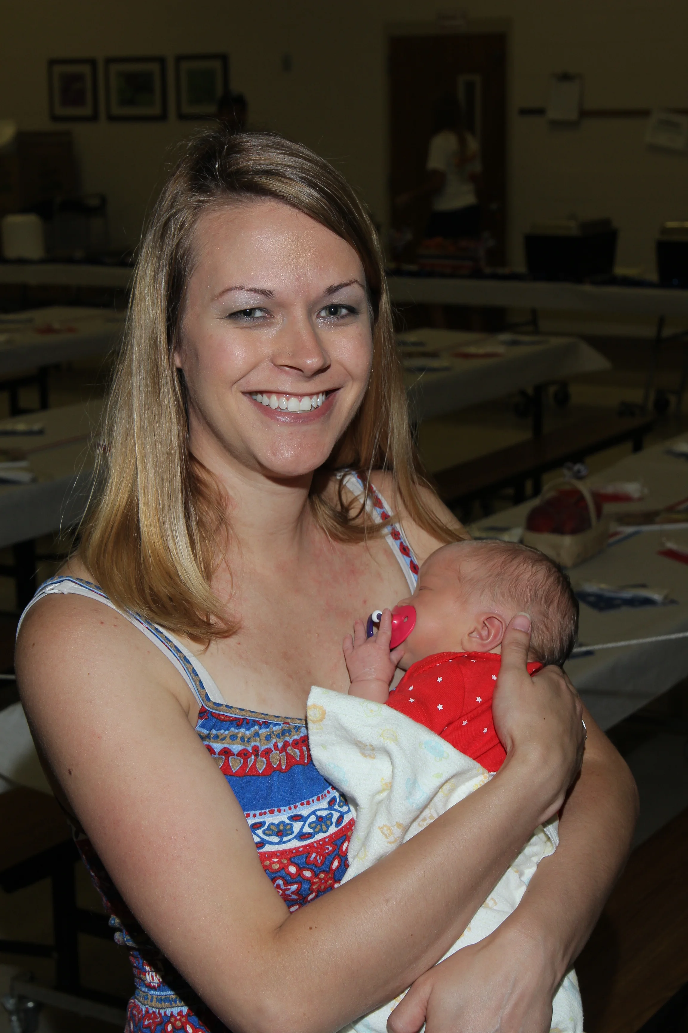 Youngest in attendance at the 2014 Peach Festival,&nbsp;Ryles&nbsp;Stidham&nbsp;with her mother, Starla.