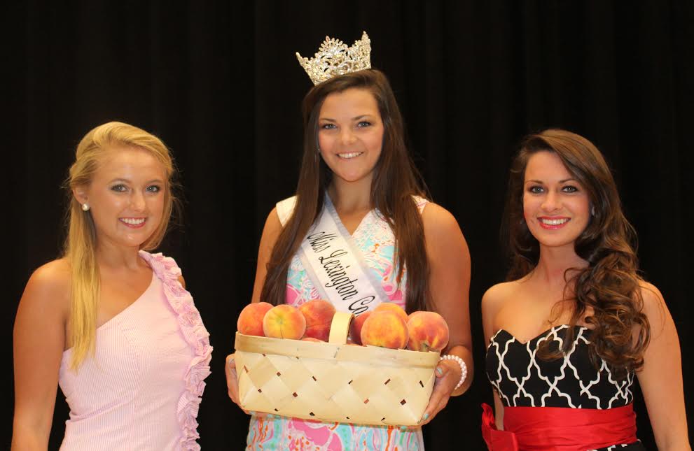 2014 Peach Queen Kaylee Cuthbertson, with two of the 2015 contestants; left to right, Jamie Vaughn, Reigning Peach Queen Kaylee Cuthbertson, and Lindsey Roof.