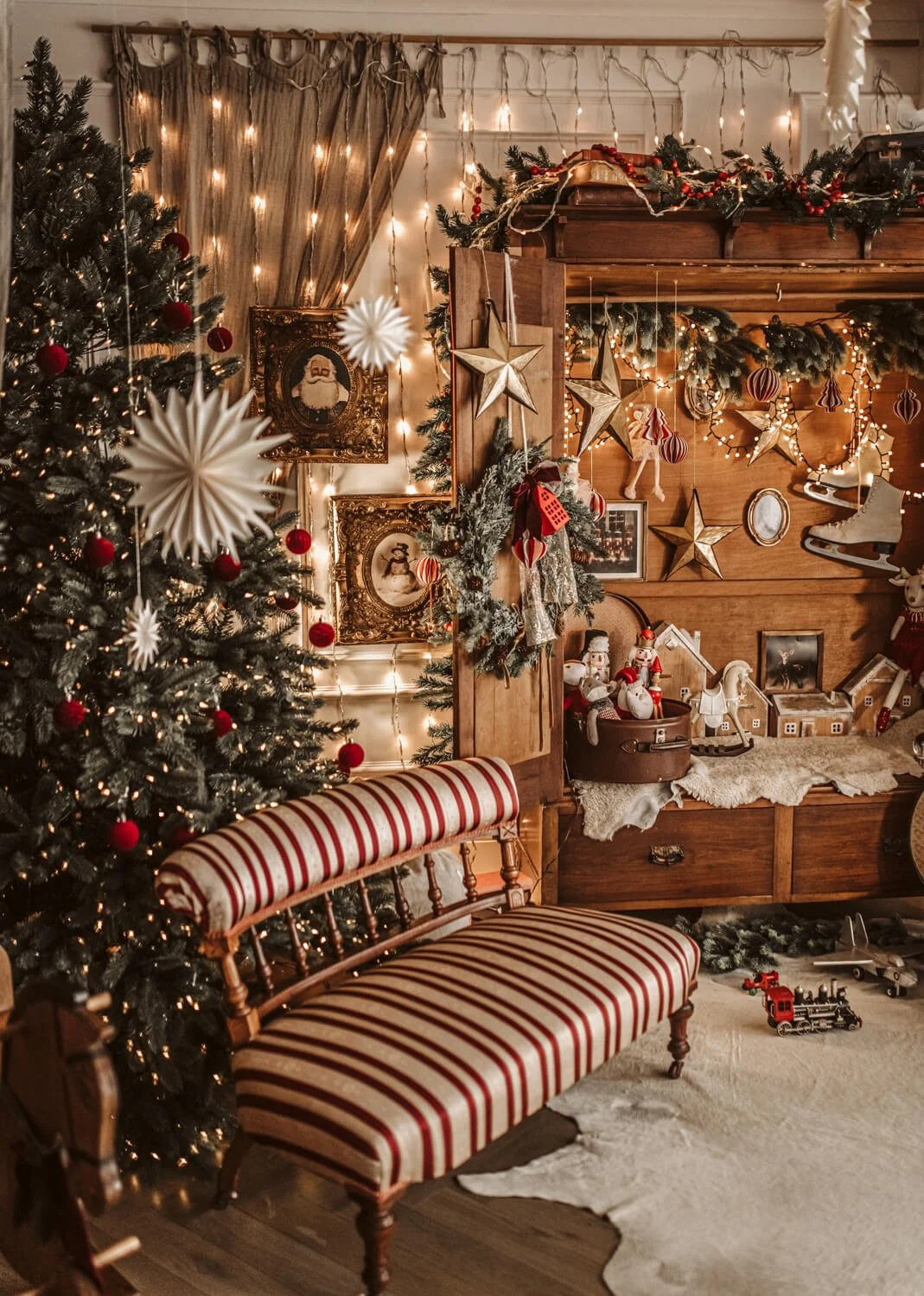 Warm, natural light studio setup for Christmas mini sessions in Melbourne featuring real vintage props and timeless holiday styling.