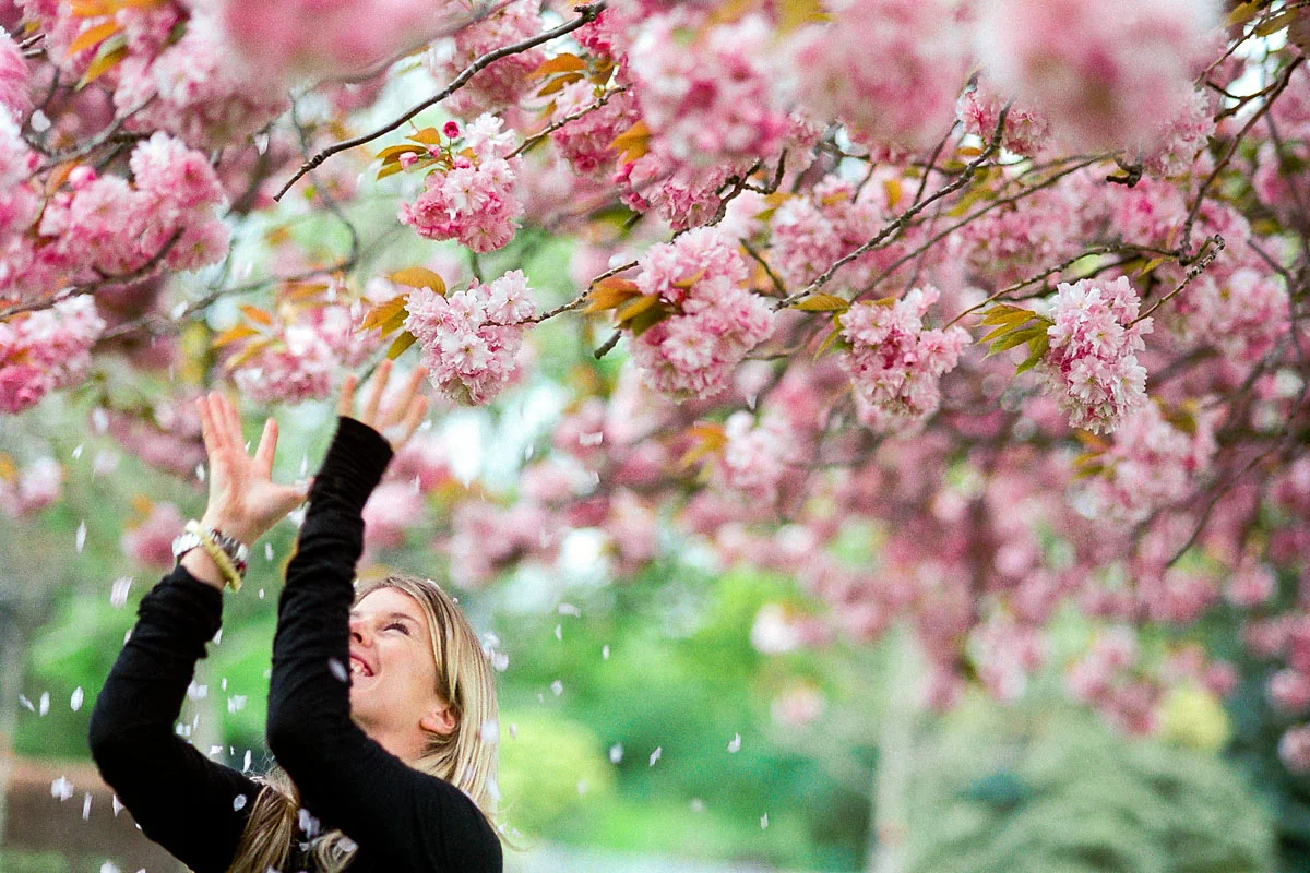 Young woman with Spring blossom, London